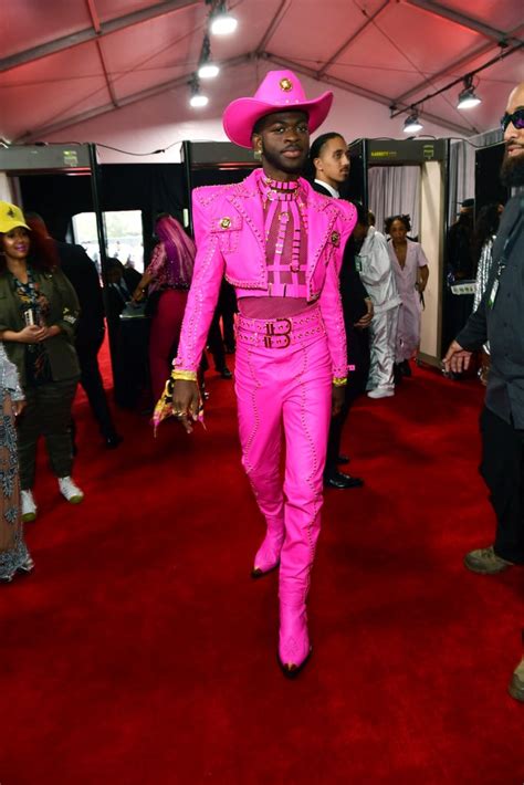 Pink Versace suit and harness of Lil Nas X 